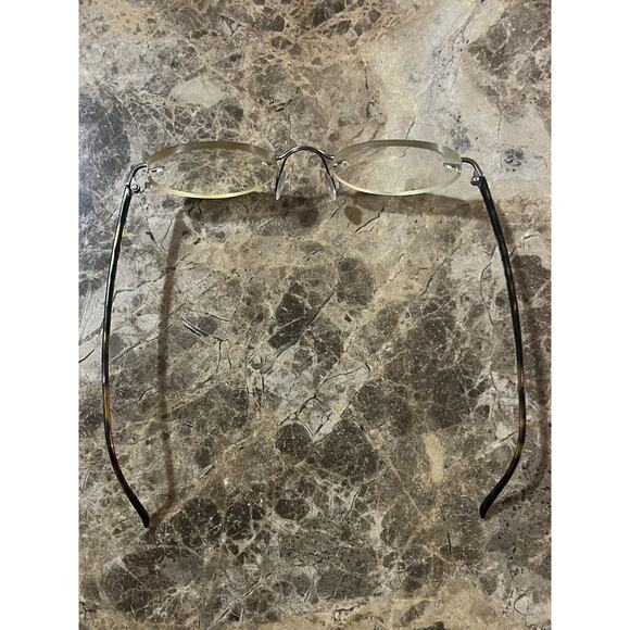 Marchon Airlock 2 - 770/39 RIMLESS EYEGLASSES 47-21-135 color 015 Tortoise - Picture 11 of 11